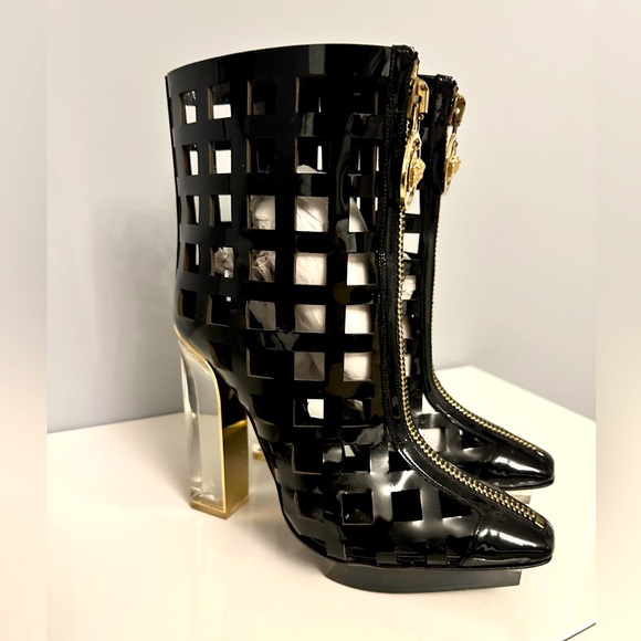 Versace Boots 
Glamorous and stylistic. This statement piece was  worn once. - Picture 2 of 12
